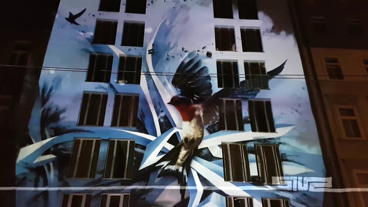 bird projected on building